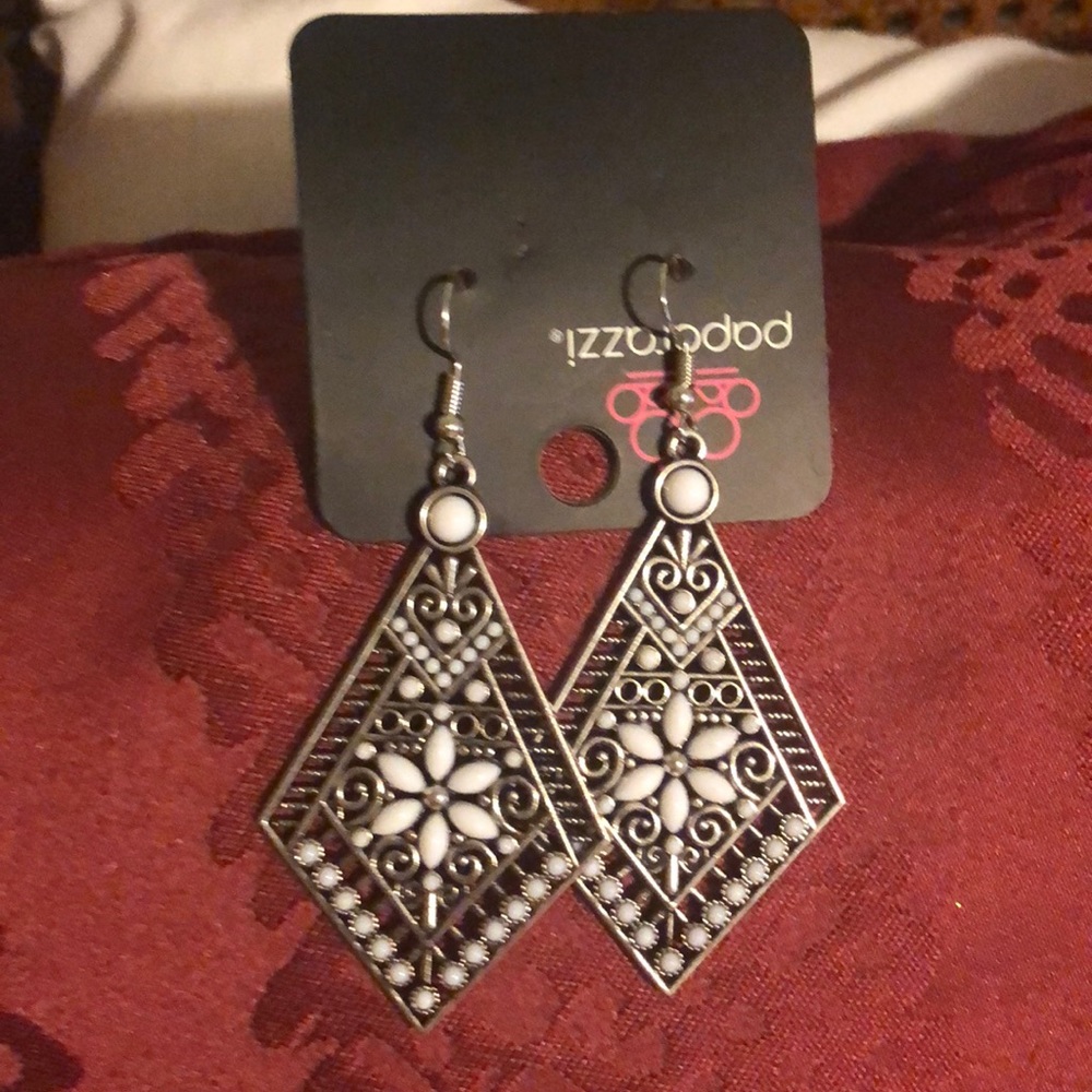 A pair of super cute dangled earrings